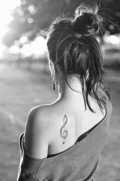 Musical Note Upper Shoulder Tattoo For Girls